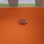 four teardrop pavé silver ring