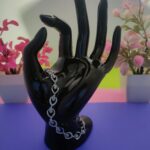 Adjustable heart design silver bracelet close-up