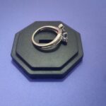 Polished sterling silver ring with stone accents