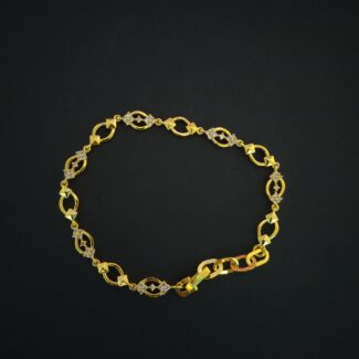 Gold finish patterned link 925 silver bracelet with zircon accents